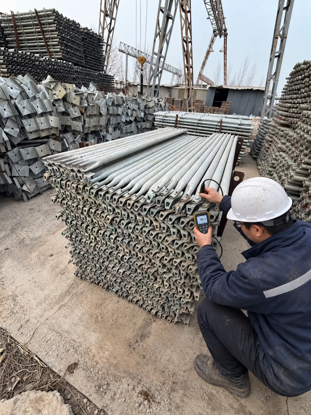 Galvanized Ringlock components checked with a coating thickness gauge
